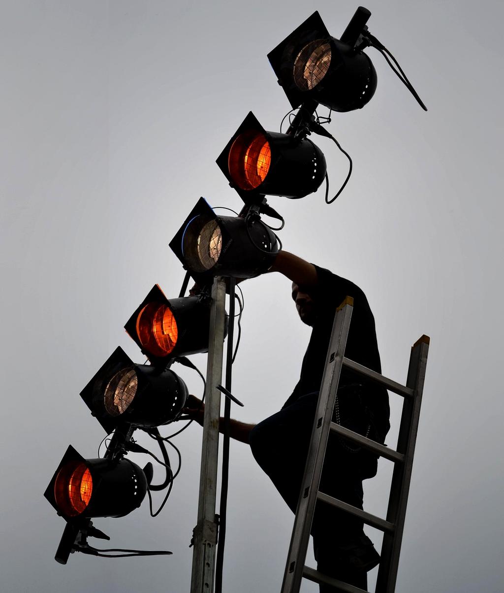 Electrician consulting customer and providing detailed quote for electrical work in Singapore