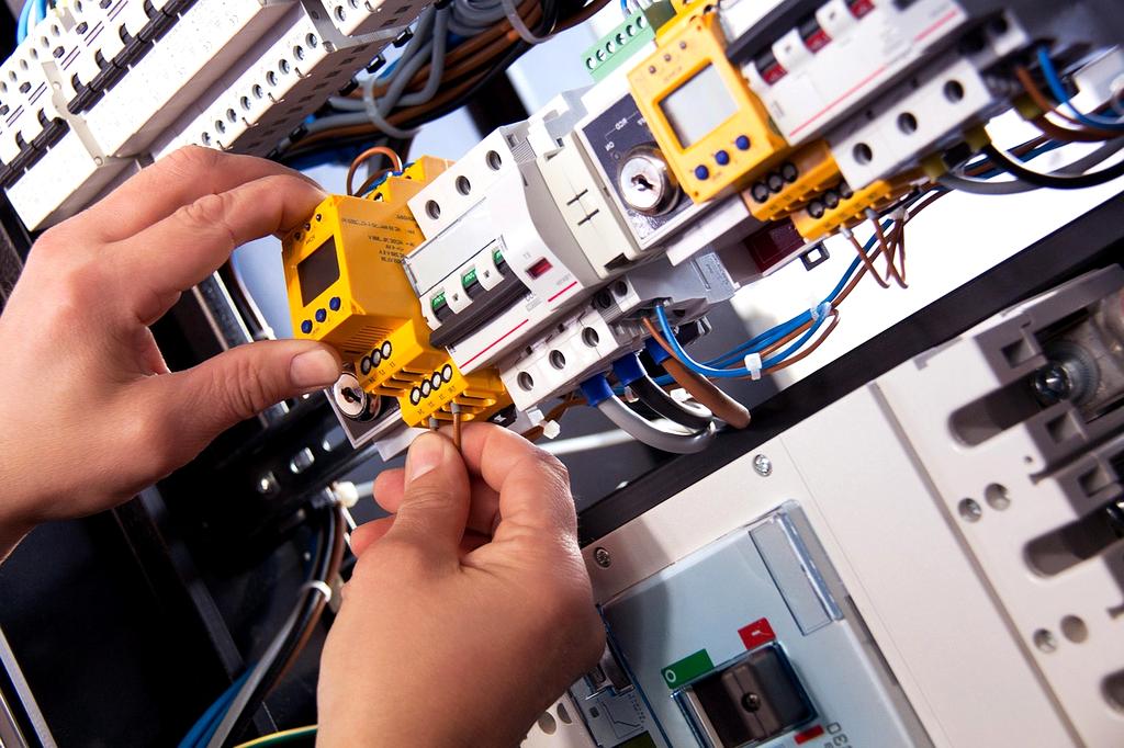 Modern commercial office electrical installation with LED lighting and automated systems